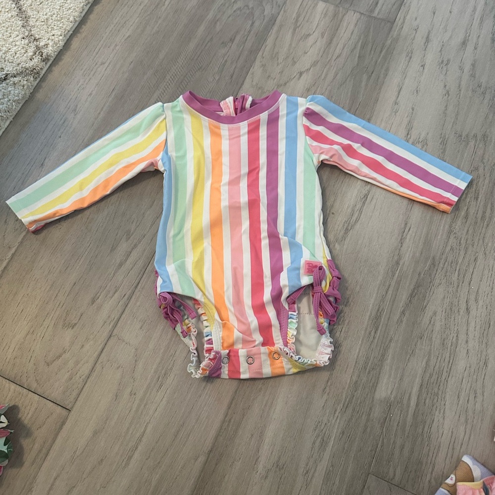 Ruffle butts Rainbow Striped Baby Onesie